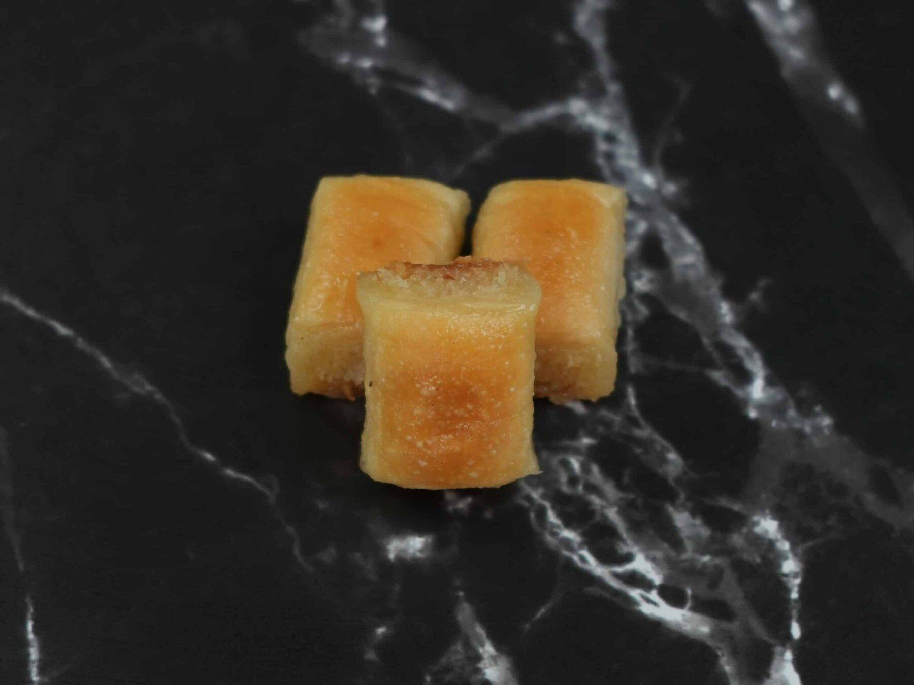Kokosstäbchen – أصابع جوز الهند